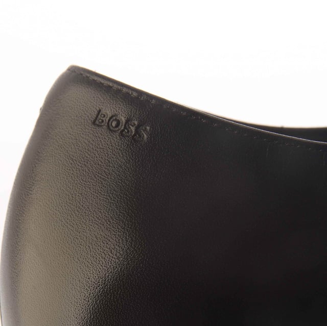 Men's Boss Derrek Derby Shoes in Brown Mens Boss Derrek Derby Shoes in brown.- Leather upper.- Lace up fastening.- Panelled.- Almond toe.- Stacked wooden sole.- Ref: 50492642202