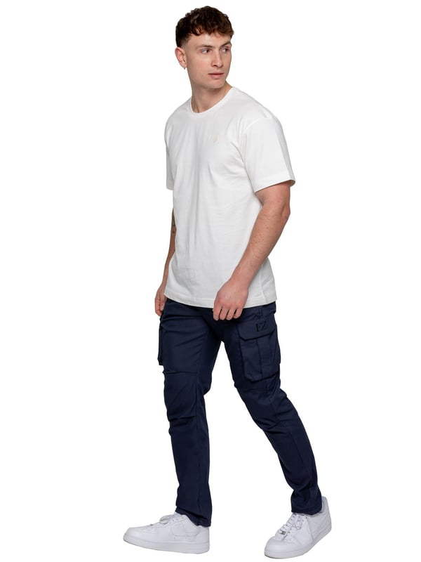 Upgrade your everyday style with the Enzo Men's Cargo Pants. Crafted from premium stretch fabric, these lightweight trousers offer a tapered leg fit for a sleek, modern look. Featuring an elasticated waistband with an adjustable toggle, they provide a customizable fit, while the adjustable toggle ankles let you tailor the look and feel. With two side slash pockets, two cargo pockets with secure Velcro fastening, and a single back welt pocket, you’ll have ample storage for essentials. Finished with an Enzo print on the cargo pocket. (649)