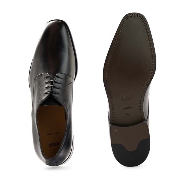 Mens BOSS Lisbon Derby Shoes in black.- Made in Italy.- Premium BOSS business footwear.- Derby upper design in soft leather with stitching details.- Soft cognac lining and a comfortable insole for maximum cushioning and leather sole for a characterful effect.- RESPONSIBLE STYLE- Ref: 50470980-001