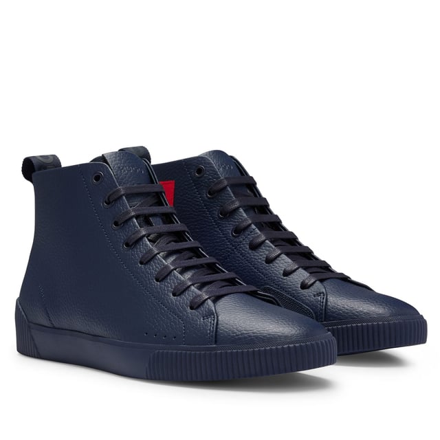 Men's Hugo Zero Hi-Top Trainers in Dark Blue Mens HUGO Zero Hi-Top Trainers in dark blue.- Grainy leather Rubber sole- Construction: Cemented- Big woven label with reversed logo HUGO icon- Ref: 50471336-401