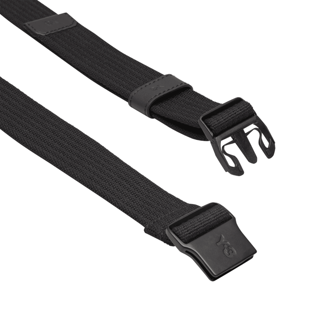 Y-3 Utility Belt in black. The Y-3 Utility Belt harnesses the power of simplicity. An understated piece  it's crafted from durable webbing and finished with a minimalist metal buckle.- An essential belt by Y-3.- Length: 50 cm.- Metal buckle closure.- Y-3 logo print.- 100% recycled polyester plain weave.- Ref: IU4623