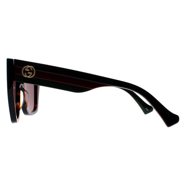 Gucci Square Womens Havana Brown GG1300S  Sunglasses are a bold and sophisticated accessory that exude luxury and style. These sunglasses feature a classic square shape with a acetate frame and iconic GG logo on the temples. Whether you're hitting the beach or the city streets, these sunglasses are the perfect accessory to complete any look.
